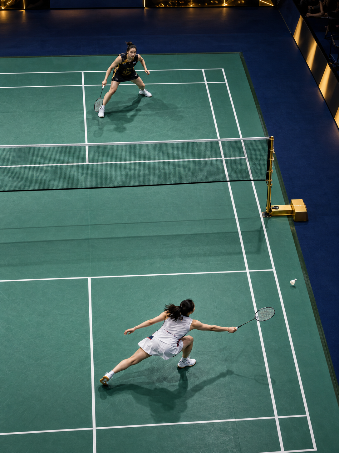 Badminton match viewed from above